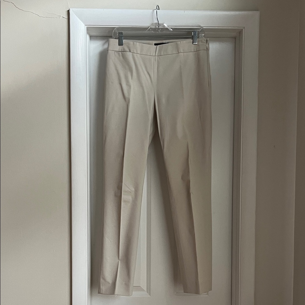 Women’s classic fit beige pants.  Size 8.